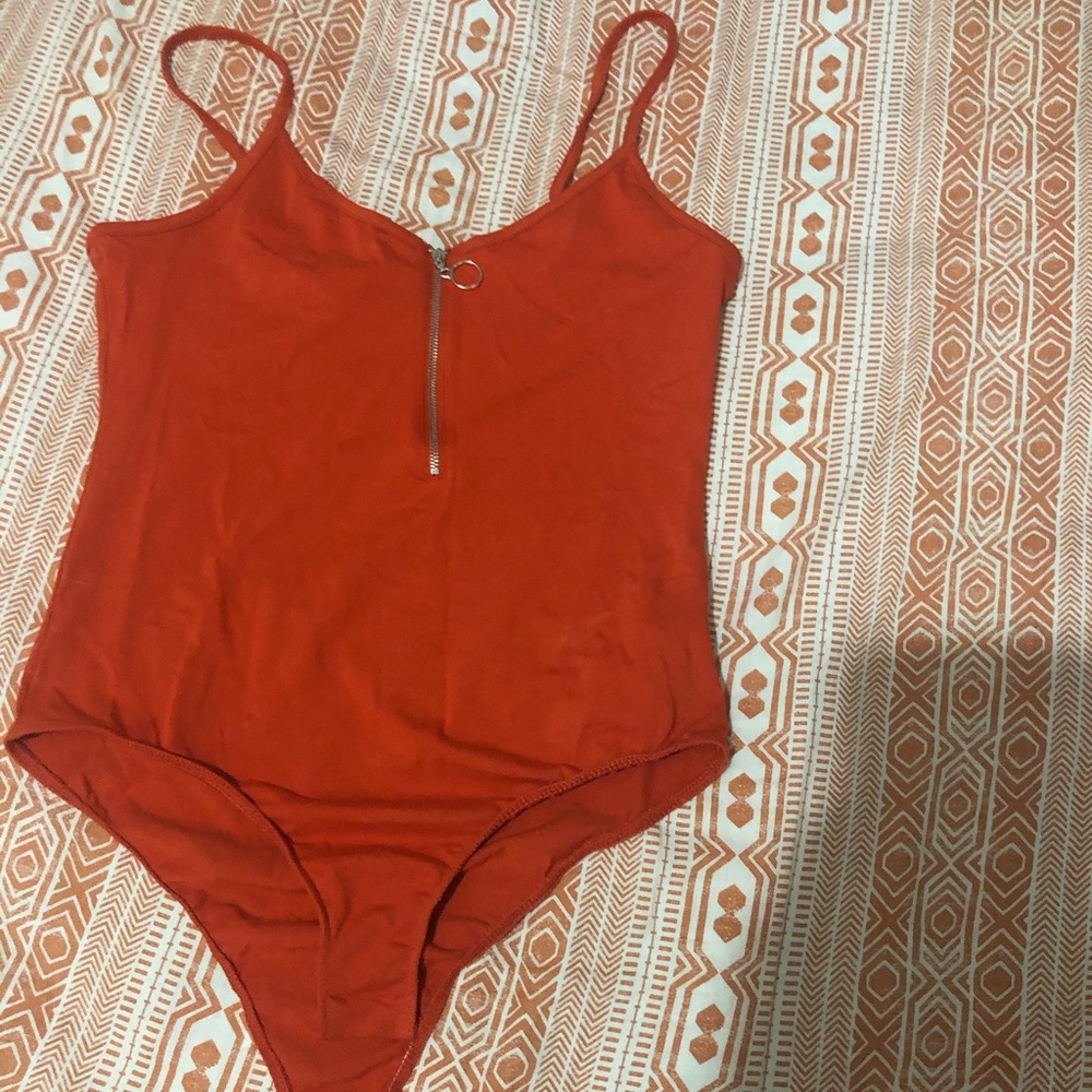 Orange bodysuit